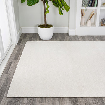 Haze Solid Low-pile Area Rug Cream